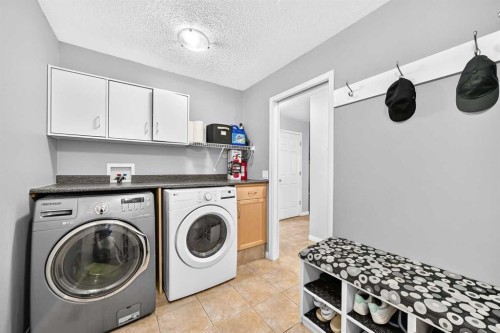 53 Everhollow Park Sw, Calgary, AB - Indoor Photo Showing Laundry Room