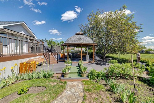 28 Westpoint Drive, Didsbury, AB - Outdoor With Deck Patio Veranda