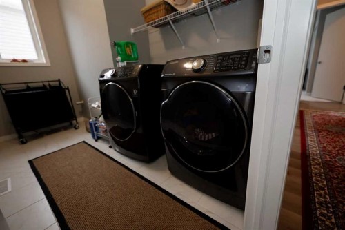 163 Cityside Park Ne, Calgary, AB - Indoor Photo Showing Laundry Room