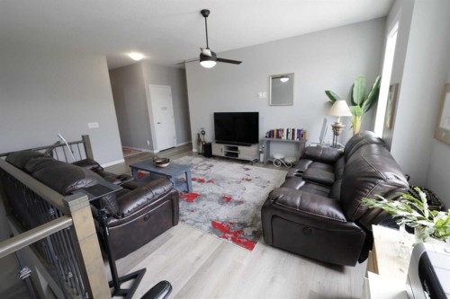 163 Cityside Park Ne, Calgary, AB - Indoor Photo Showing Living Room