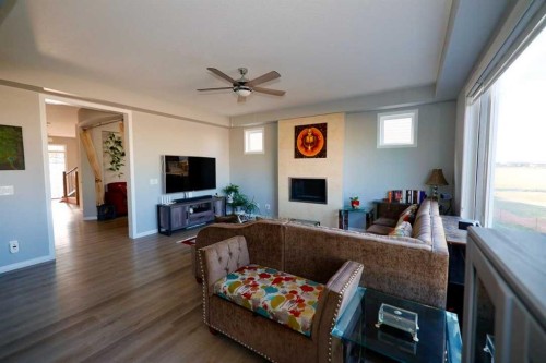 163 Cityside Park Ne, Calgary, AB - Indoor Photo Showing Living Room With Fireplace