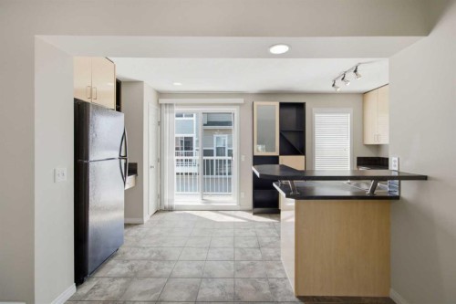 3032 New Brighton Gardens Se, Calgary, AB - Indoor Photo Showing Kitchen