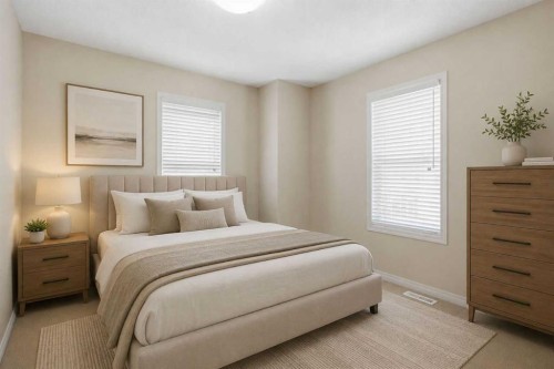 3032 New Brighton Gardens Se, Calgary, AB - Indoor Photo Showing Bedroom