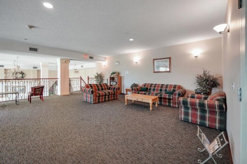 227-1920 14 Avenue Ne, Calgary, AB - Indoor Photo Showing Other Room