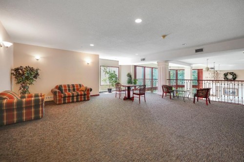 227-1920 14 Avenue Ne, Calgary, AB - Indoor Photo Showing Other Room