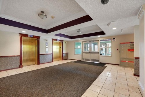 227-1920 14 Avenue Ne, Calgary, AB - Indoor Photo Showing Other Room