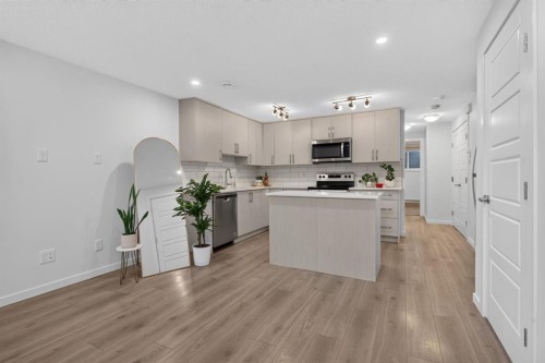 461 Cranbrook Square Se, Calgary, AB - Indoor Photo Showing Kitchen With Upgraded Kitchen