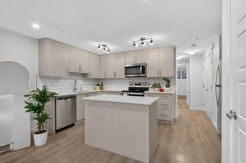 461 Cranbrook Square Se, Calgary, AB - Indoor Photo Showing Kitchen With Upgraded Kitchen