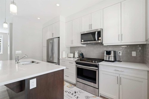 312 Wentworth Row Sw, Calgary, AB - Indoor Photo Showing Kitchen With Stainless Steel Kitchen With Double Sink With Upgraded Kitchen