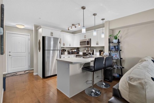 204-406 Cranberry Park Se, Calgary, AB - Indoor Photo Showing Kitchen With Stainless Steel Kitchen