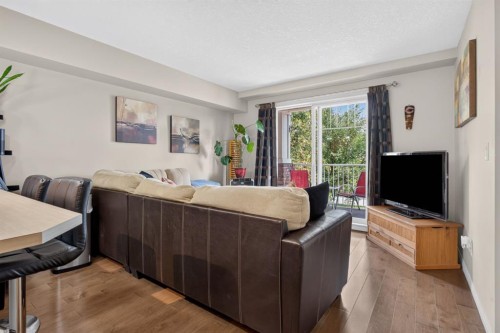 204-406 Cranberry Park Se, Calgary, AB - Indoor Photo Showing Living Room