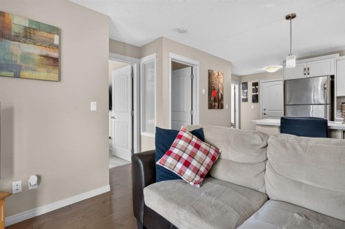 204-406 Cranberry Park Se, Calgary, AB - Indoor Photo Showing Living Room