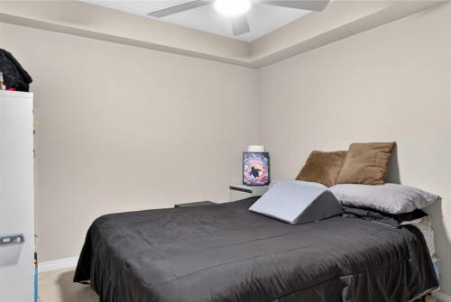 204-406 Cranberry Park Se, Calgary, AB - Indoor Photo Showing Bedroom