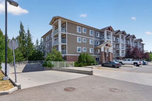204-406 Cranberry Park Se, Calgary, AB - Outdoor With Balcony With Facade
