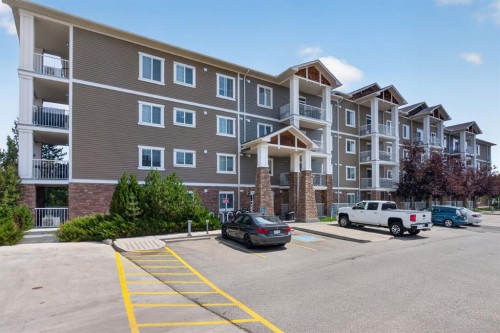 204-406 Cranberry Park Se, Calgary, AB - Outdoor With Balcony With Facade