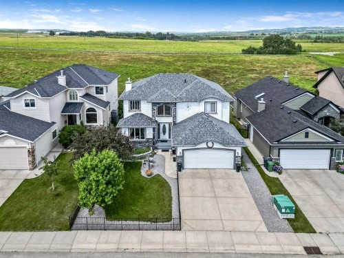 43 Sheep River Heights, Okotoks, AB - Outdoor With Facade