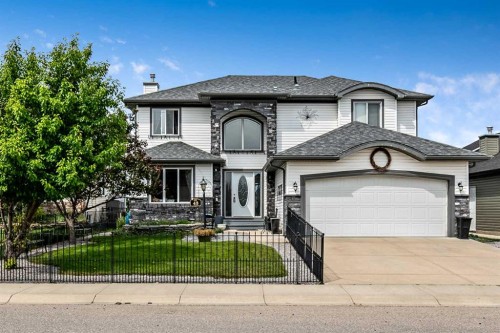 43 Sheep River Heights, Okotoks, AB - Outdoor With Facade