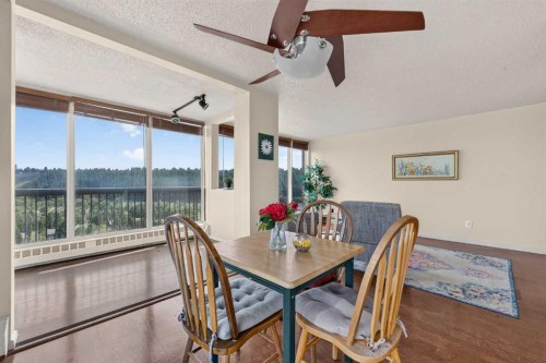 1607-145 Point Drive Nw, Calgary, AB - Indoor Photo Showing Dining Room