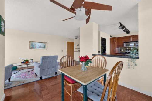 1607-145 Point Drive Nw, Calgary, AB - Indoor Photo Showing Dining Room
