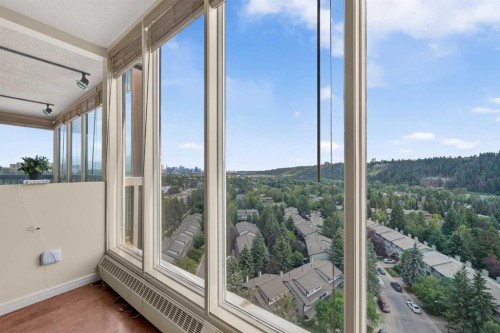 1607-145 Point Drive Nw, Calgary, AB - Indoor Photo Showing Other Room
