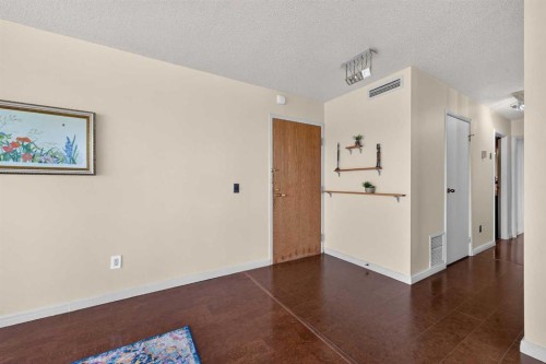 1607-145 Point Drive Nw, Calgary, AB - Indoor Photo Showing Other Room