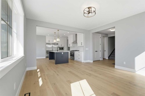 1209 Coopers Drive Sw, Airdrie, AB - Indoor Photo Showing Other Room