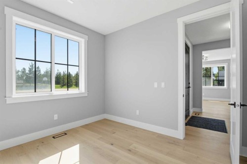 1209 Coopers Drive Sw, Airdrie, AB - Indoor Photo Showing Other Room
