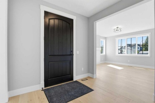 1209 Coopers Drive Sw, Airdrie, AB - Indoor Photo Showing Other Room
