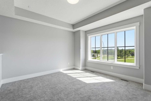 1209 Coopers Drive Sw, Airdrie, AB - Indoor Photo Showing Other Room