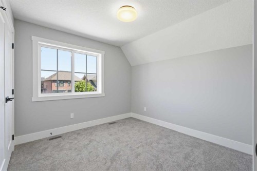 1209 Coopers Drive Sw, Airdrie, AB - Indoor Photo Showing Other Room