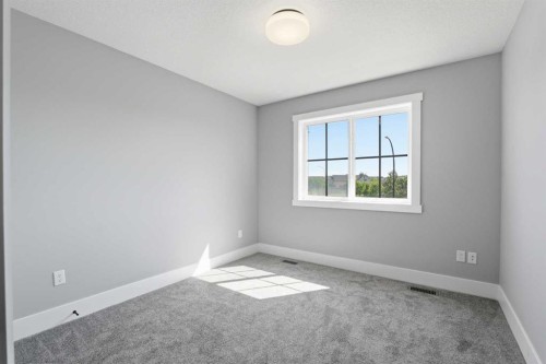 1209 Coopers Drive Sw, Airdrie, AB - Indoor Photo Showing Other Room