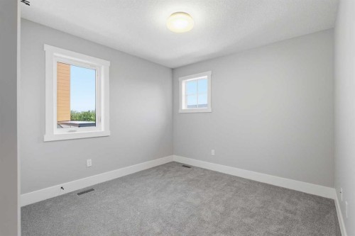 1209 Coopers Drive Sw, Airdrie, AB - Indoor Photo Showing Other Room