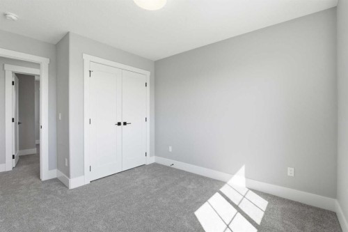 1209 Coopers Drive Sw, Airdrie, AB - Indoor Photo Showing Other Room