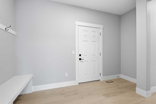 1209 Coopers Drive Sw, Airdrie, AB - Indoor Photo Showing Other Room