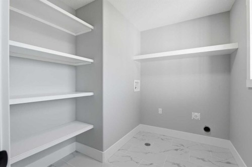 1209 Coopers Drive Sw, Airdrie, AB - Indoor With Storage