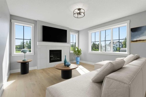 1209 Coopers Drive Sw, Airdrie, AB - Indoor Photo Showing Living Room With Fireplace