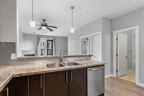 405-880 Centre Avenue Ne, Calgary, AB - Indoor Photo Showing Kitchen With Double Sink