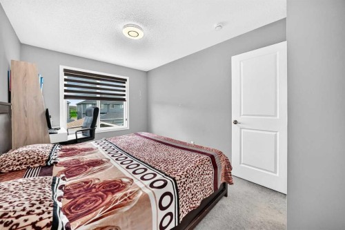 59 Corner Meadows Villas Ne, Calgary, AB - Indoor Photo Showing Bedroom