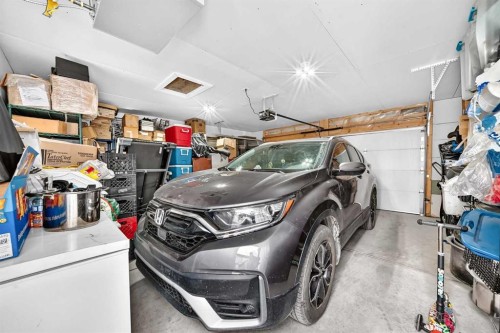 59 Corner Meadows Villas Ne, Calgary, AB - Indoor Photo Showing Garage