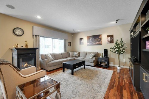 117 Marina Bay, Chestermere, AB - Indoor Photo Showing Living Room With Fireplace