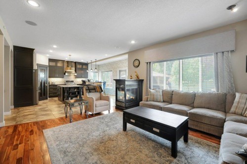 117 Marina Bay, Chestermere, AB - Indoor Photo Showing Living Room With Fireplace