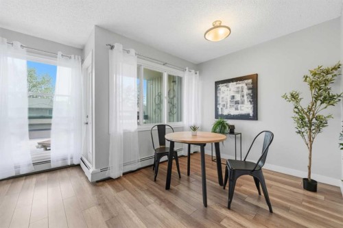 122-860 Midridge Drive Se, Calgary, AB - Indoor Photo Showing Dining Room