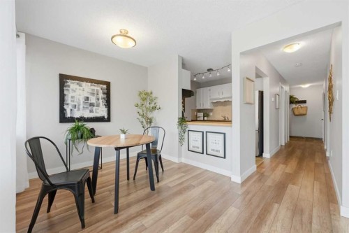 122-860 Midridge Drive Se, Calgary, AB - Indoor Photo Showing Dining Room
