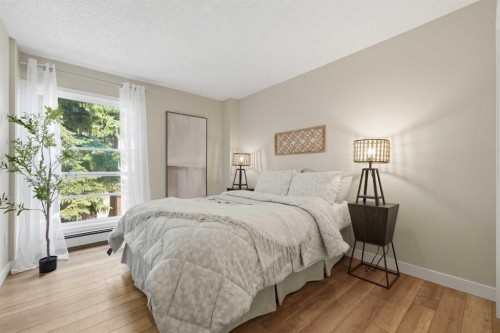 122-860 Midridge Drive Se, Calgary, AB - Indoor Photo Showing Bedroom