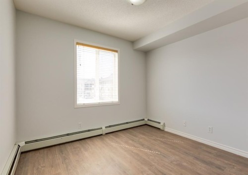 216-2000 Citadel Meadow Point Nw, Calgary, AB - Indoor Photo Showing Other Room