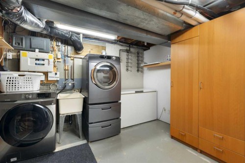 2712 Conrad Drive Nw, Calgary, AB - Indoor Photo Showing Laundry Room