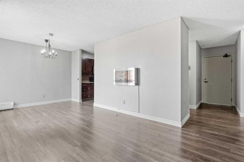 406-145 Point Drive Nw, Calgary, AB - Indoor Photo Showing Other Room