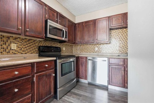 406-145 Point Drive Nw, Calgary, AB - Indoor Photo Showing Kitchen