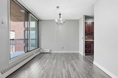 406-145 Point Drive Nw, Calgary, AB - Indoor Photo Showing Other Room