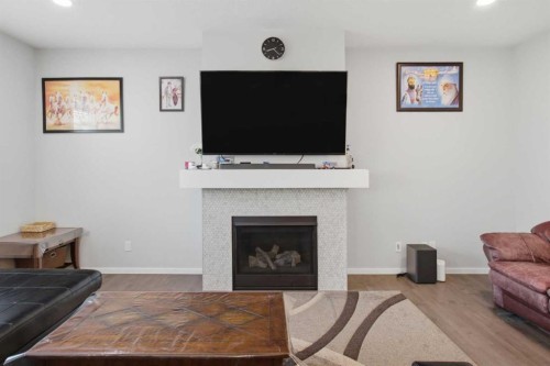 168 Savanna Lane Ne, Calgary, AB - Indoor Photo Showing Living Room With Fireplace